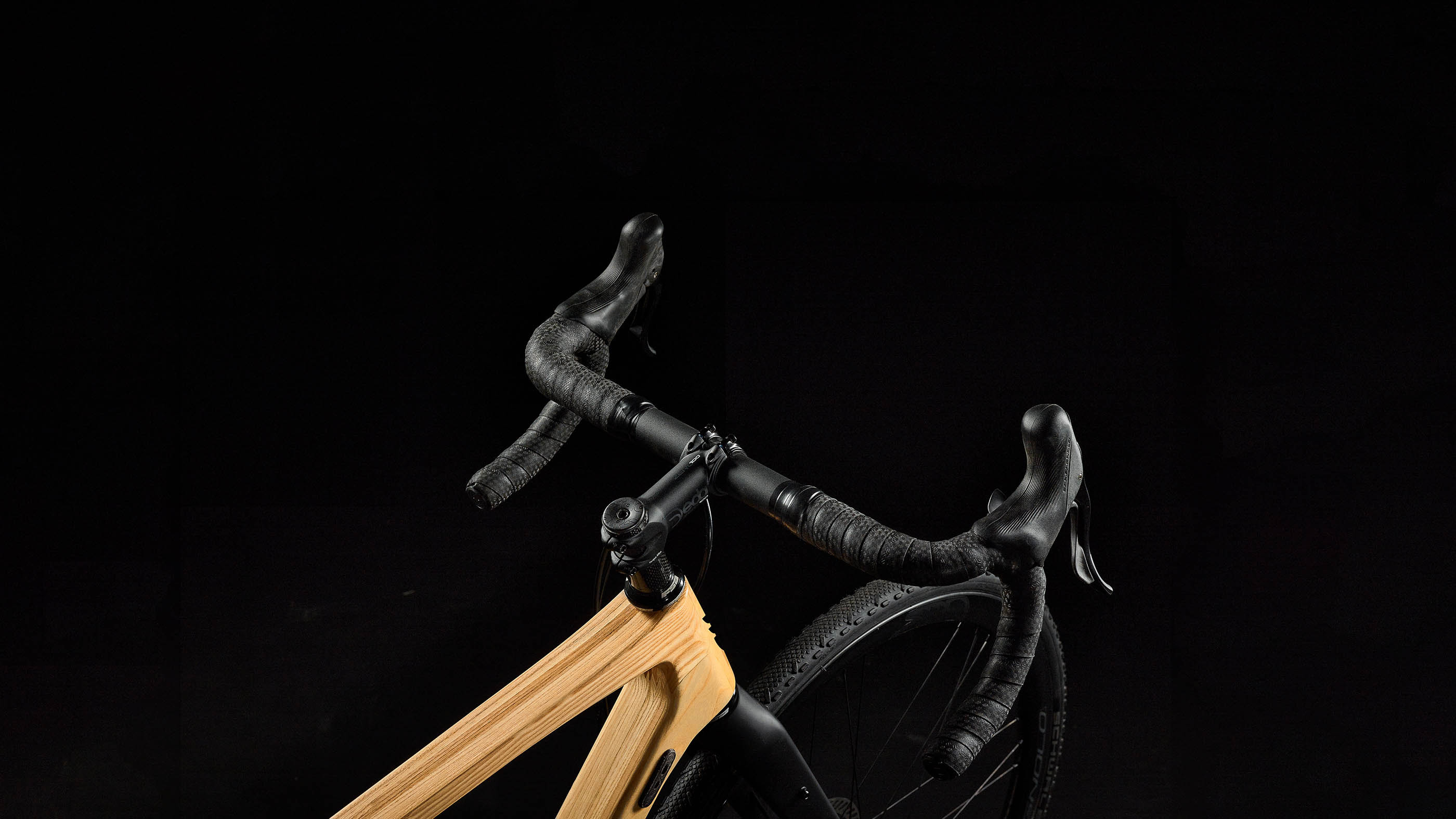 Close up of the handle of the SILA wooden gravel bike