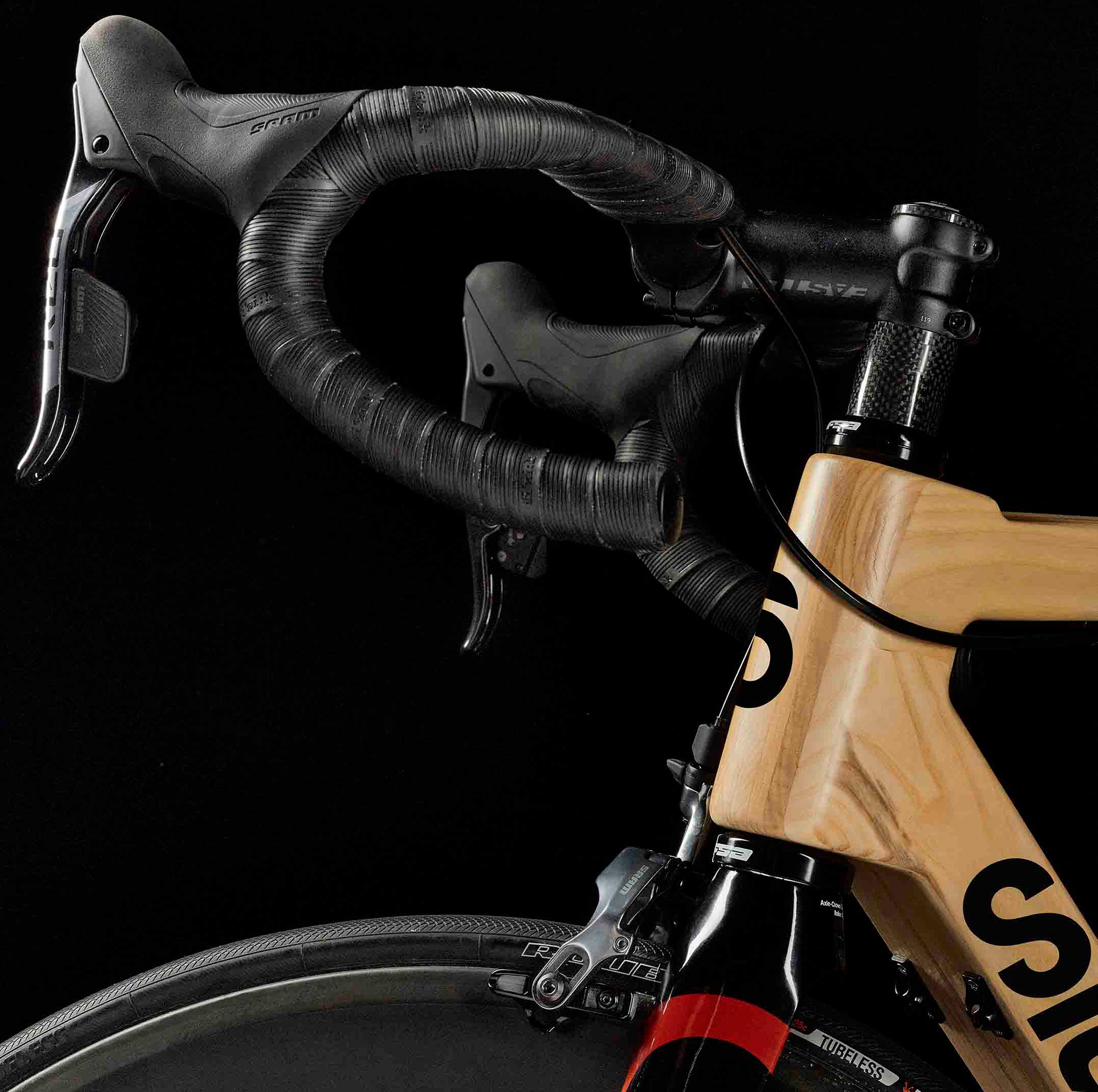 Close up of the front brake on the SILA wooden bike