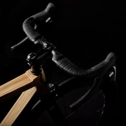 Close up of the handle of the SILA wooden road bike